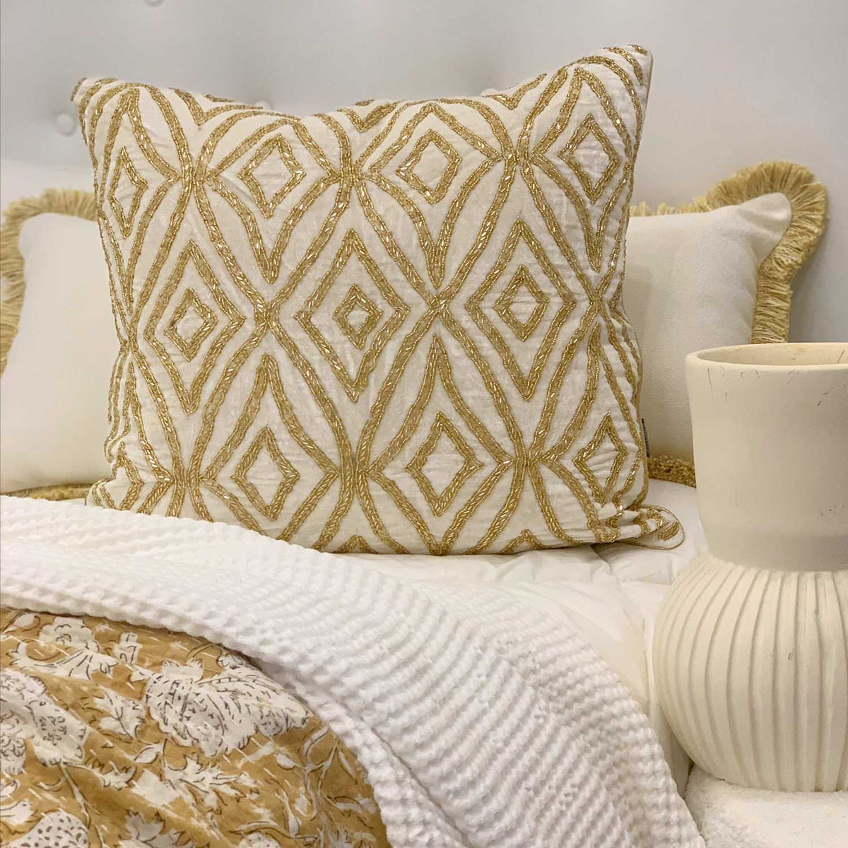 Marrakech Beaded Cushion cream The Bedspread Shop