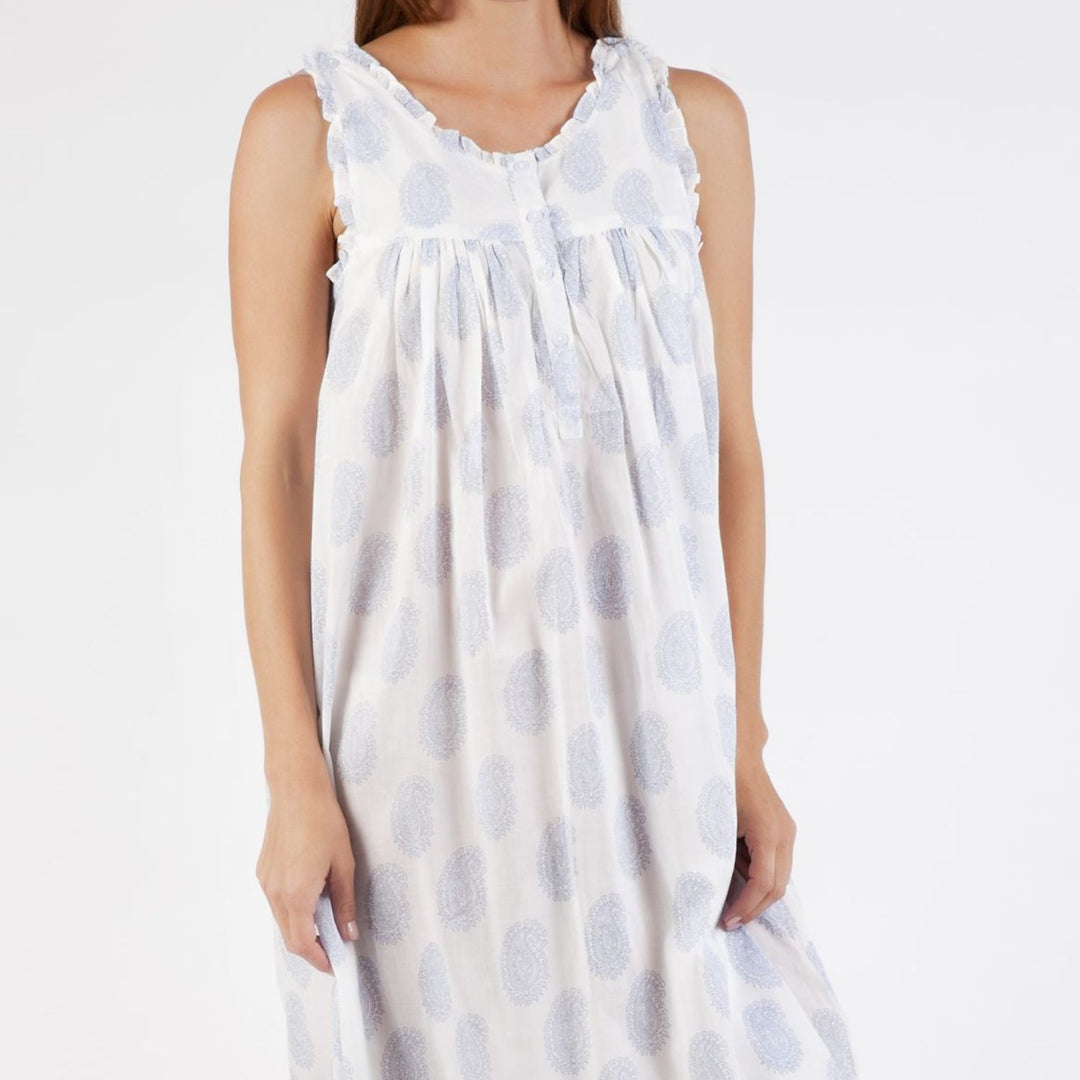 Close-up of Clara nightie bodice showing delicate frill detail, light blue paisley print and gathered cotton fabric
