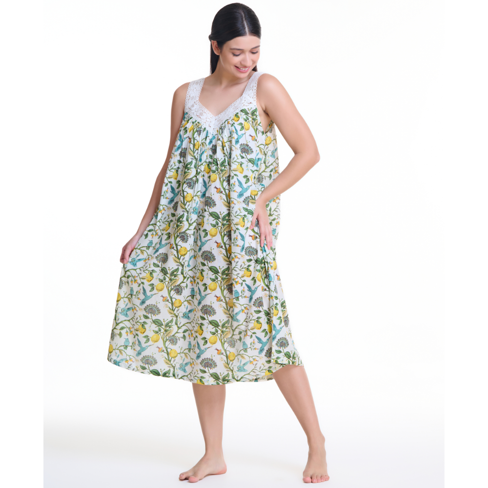 Flowing cotton nightie with lemon and bird motif, model standing barefoot