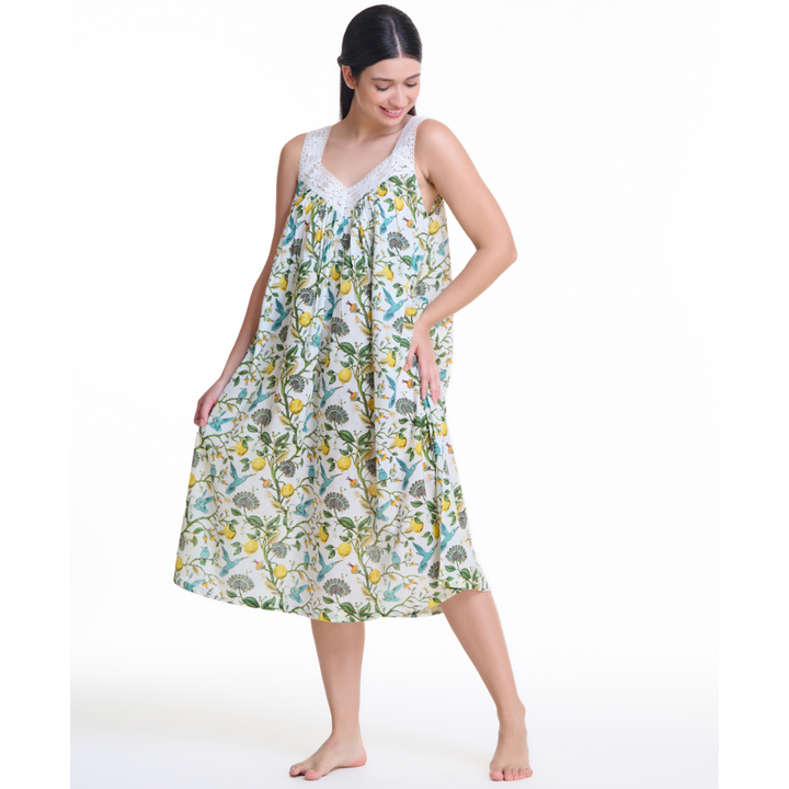 Flowing cotton nightie with lemon and bird motif, model standing barefoot