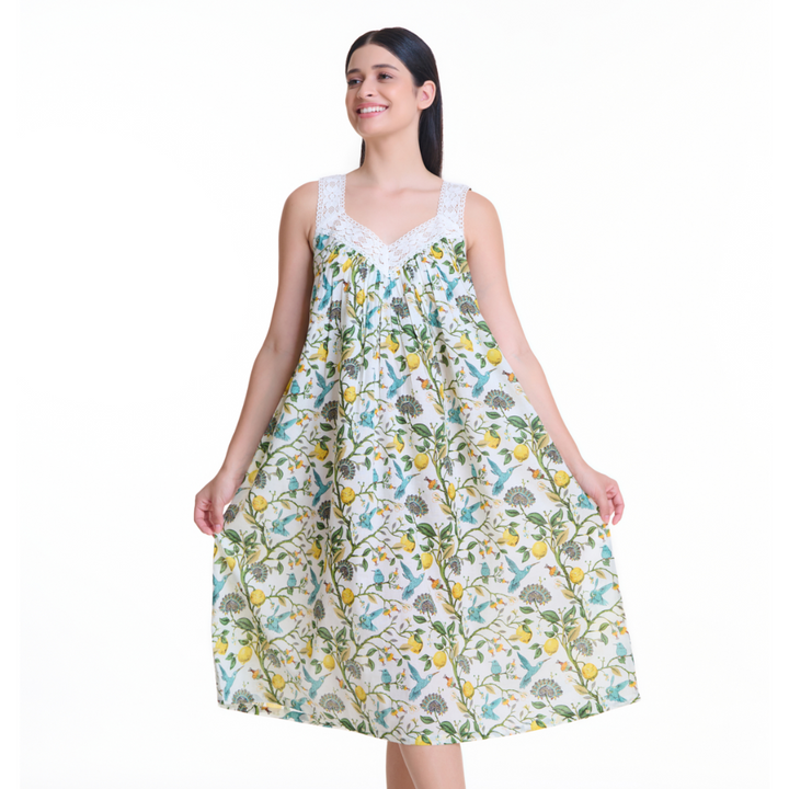 Woman wearing white cotton nightie with lace trim and floral print.