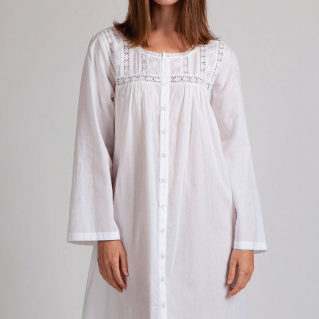 Front view of long sleeve white nightdress featuring lace detailing and buttons.