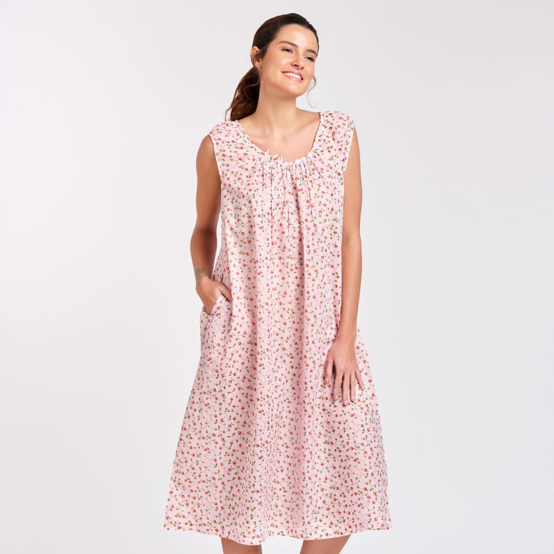 Lightweight pink floral nightie with cap sleeves and pockets, shown on model