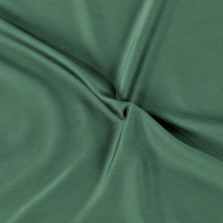 Bianca Forest Green sheet fabric detail showing soft drape and luxurious cotton-bamboo blend texture.