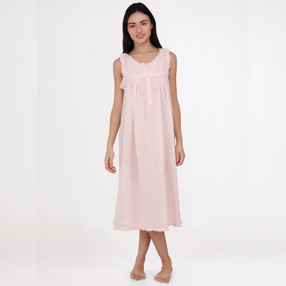 Woman wearing a pink nightgown on a white background