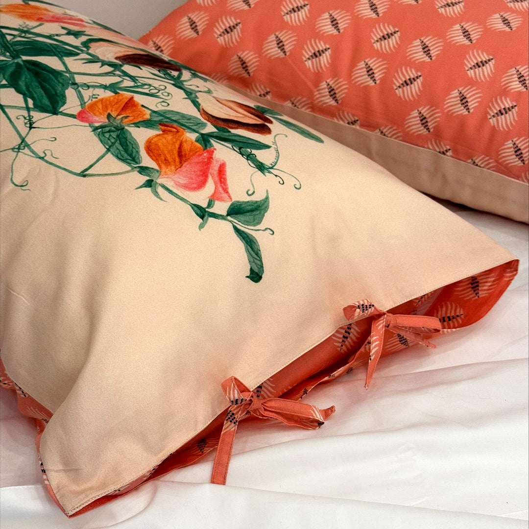 Decorative pillow with floral design on a bed