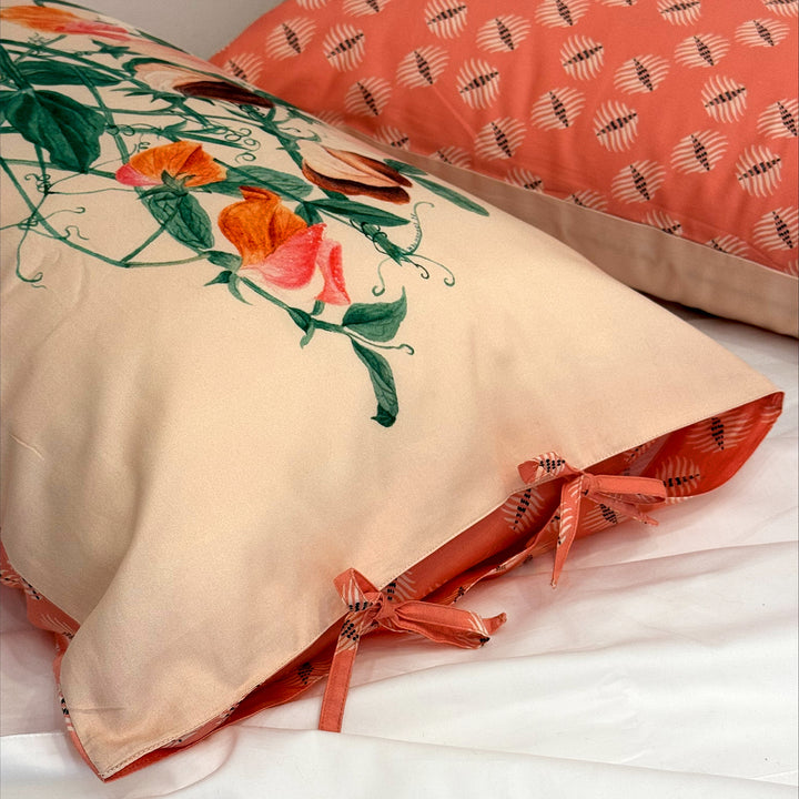 Decorative pillow with floral design on a bed